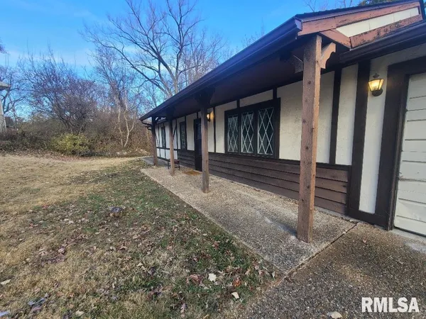 a view of a house with a porch