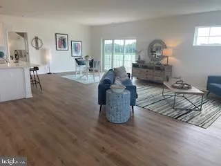 a bedroom with a bed and a desk