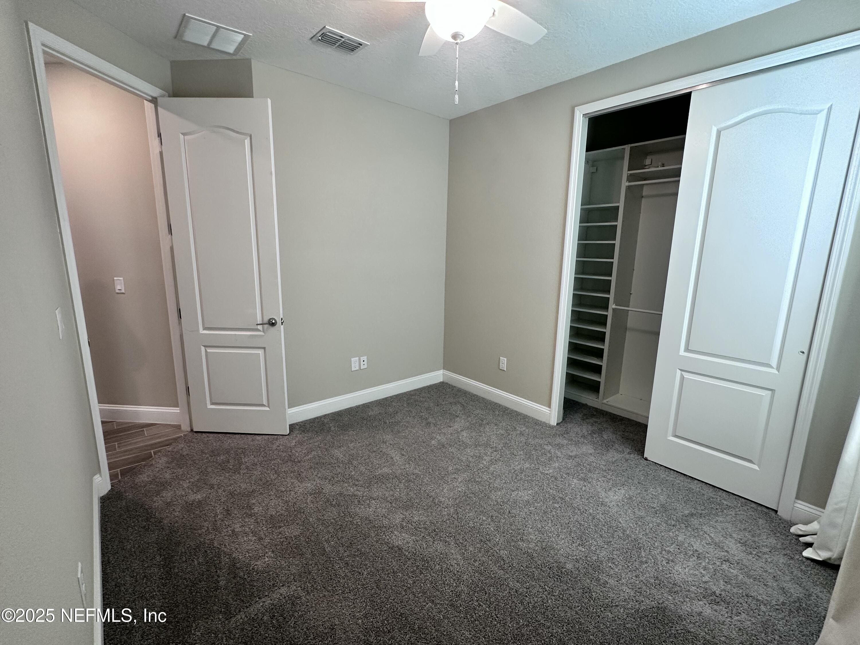 510 Broomsedge Circle St. Augustine, FL 32095 - Photo 12 of 28 an empty room with window
