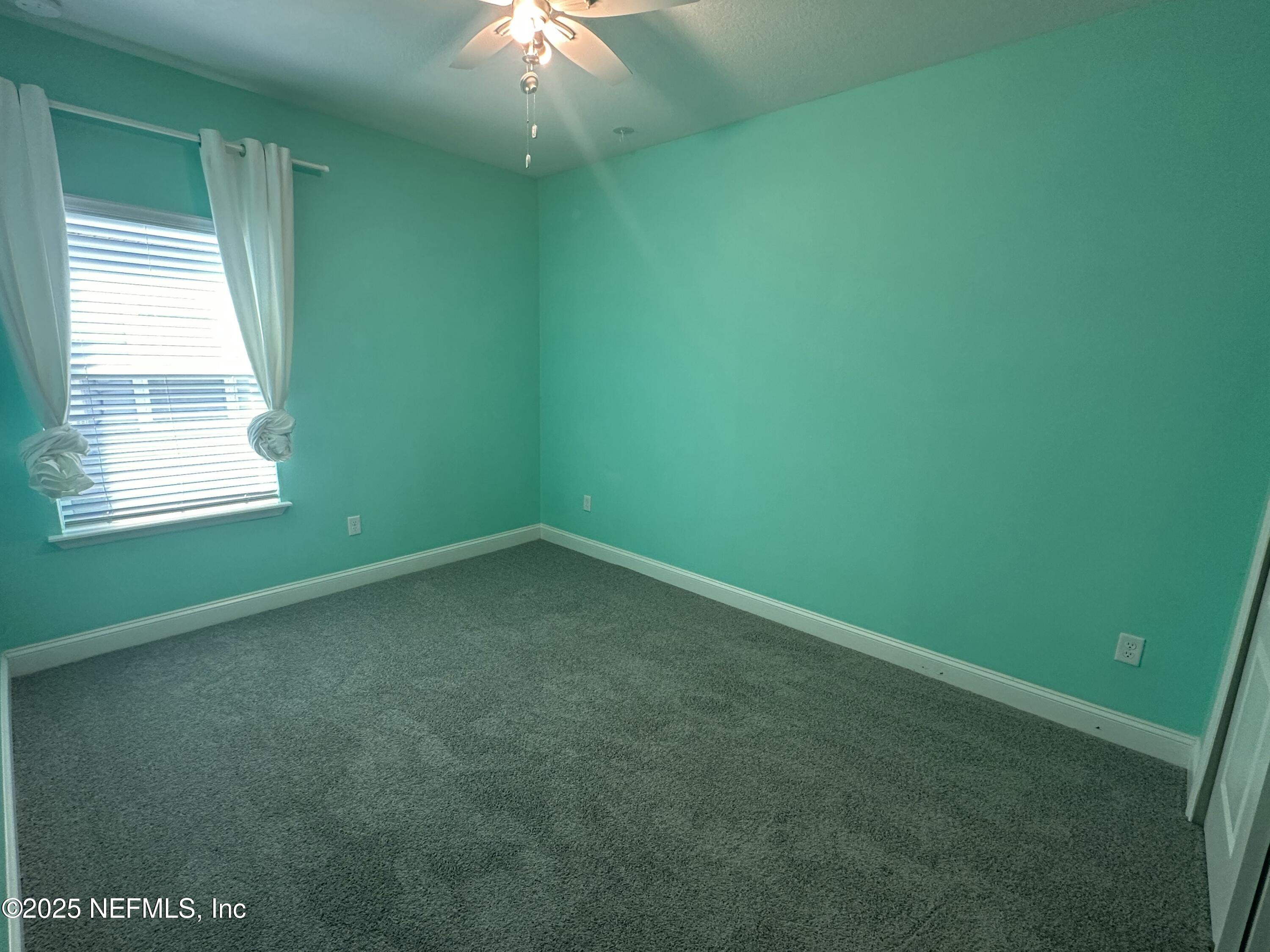 510 Broomsedge Circle St. Augustine, FL 32095 - Photo 13 of 28 a view of an empty room with a window