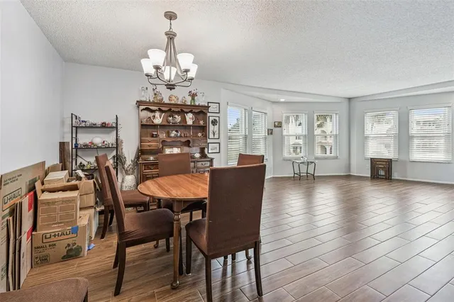 a bathroom with a sink mirror vanity and toilet
