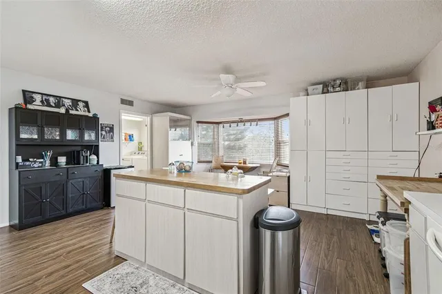 a view of a swimming pool with a yard