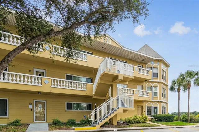 a view of a livingroom with furniture and a flat screen tv
