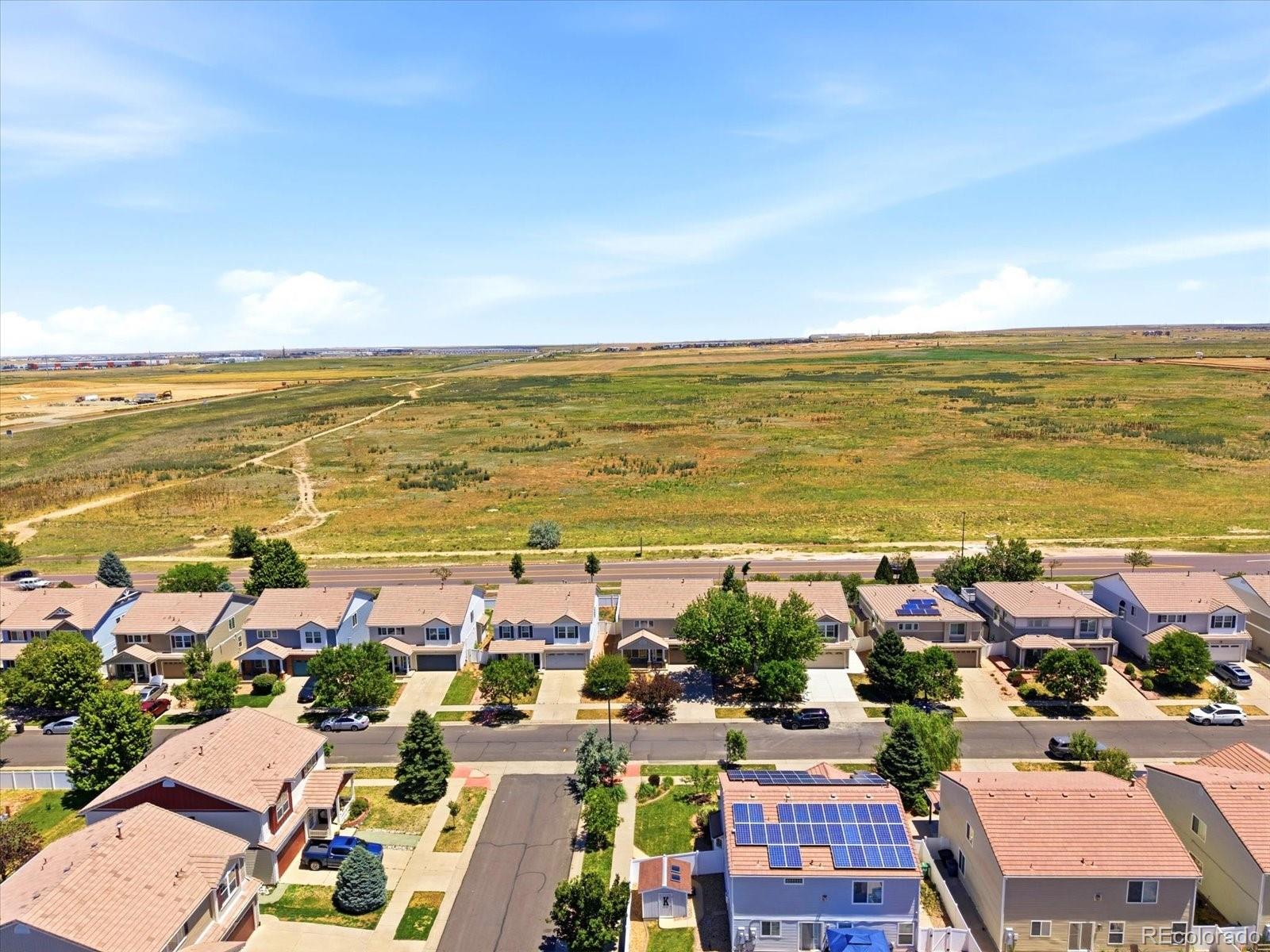 5444 Perth Court Denver, CO 80249 - Photo 45 of 46 a city view with ocean view