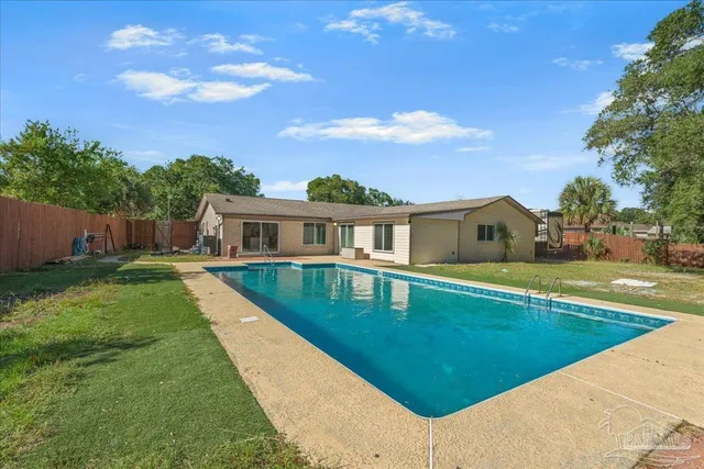 a view of a house with a swimming pool