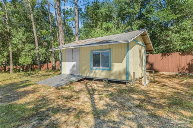a house view with a garden space