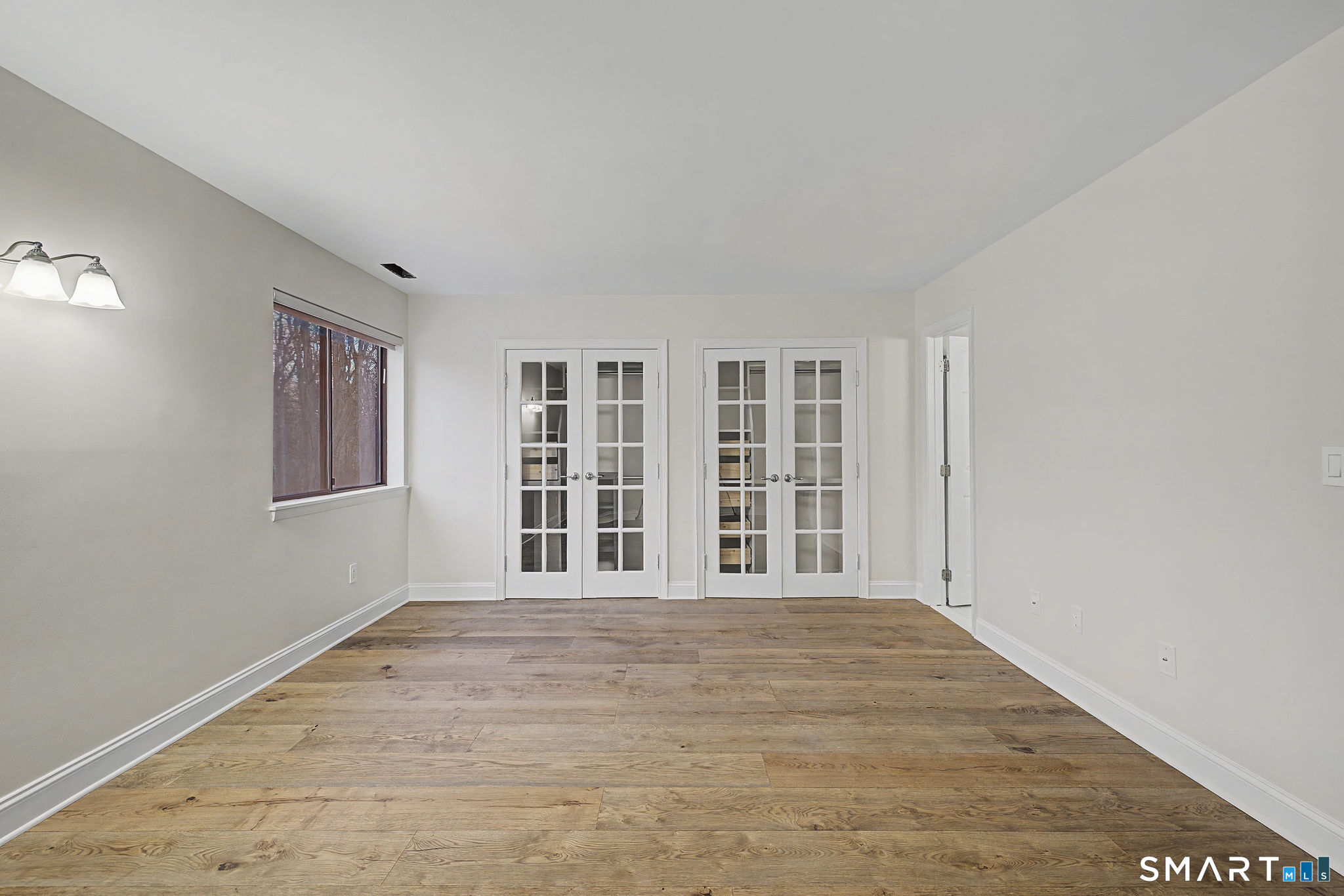123 Old Belden Hill Road, Unit 19 Norwalk, CT 06850 - Photo 18 of 31 a view of an empty room with a window