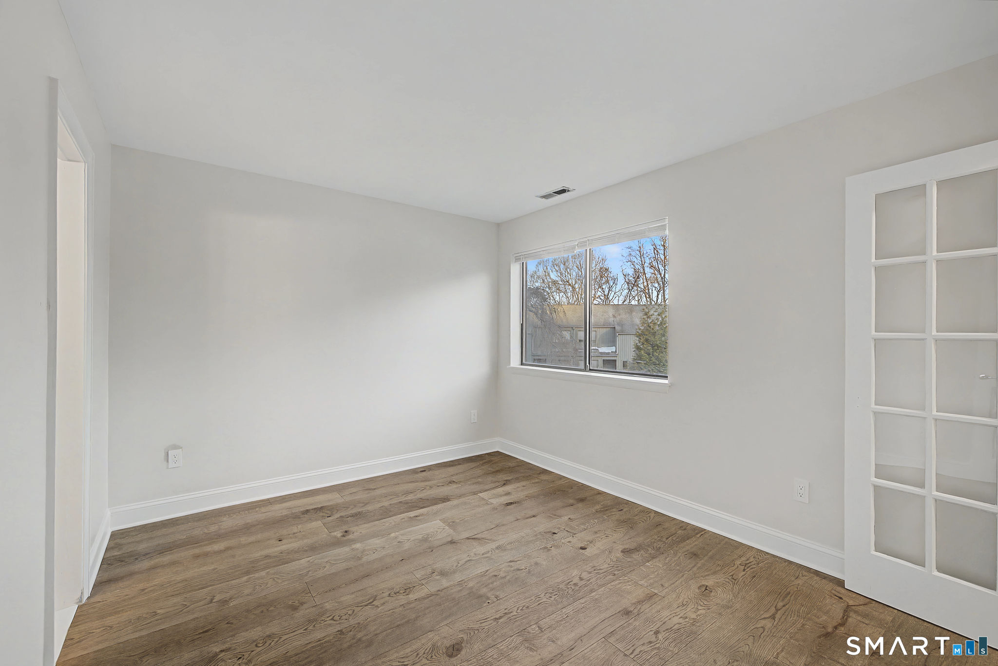 123 Old Belden Hill Road, Unit 19 Norwalk, CT 06850 - Photo 24 of 31 wooden floor in an empty room