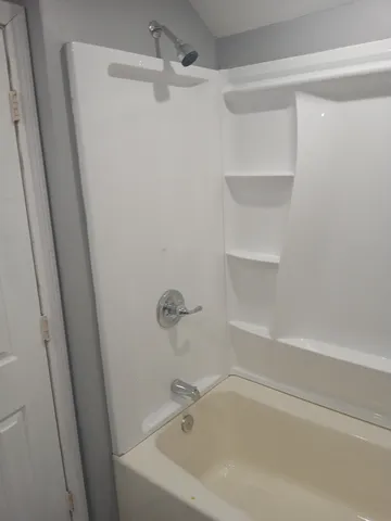 a bathroom with a bathtub
