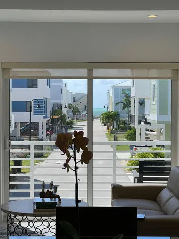 a living room view with couches and coffee table