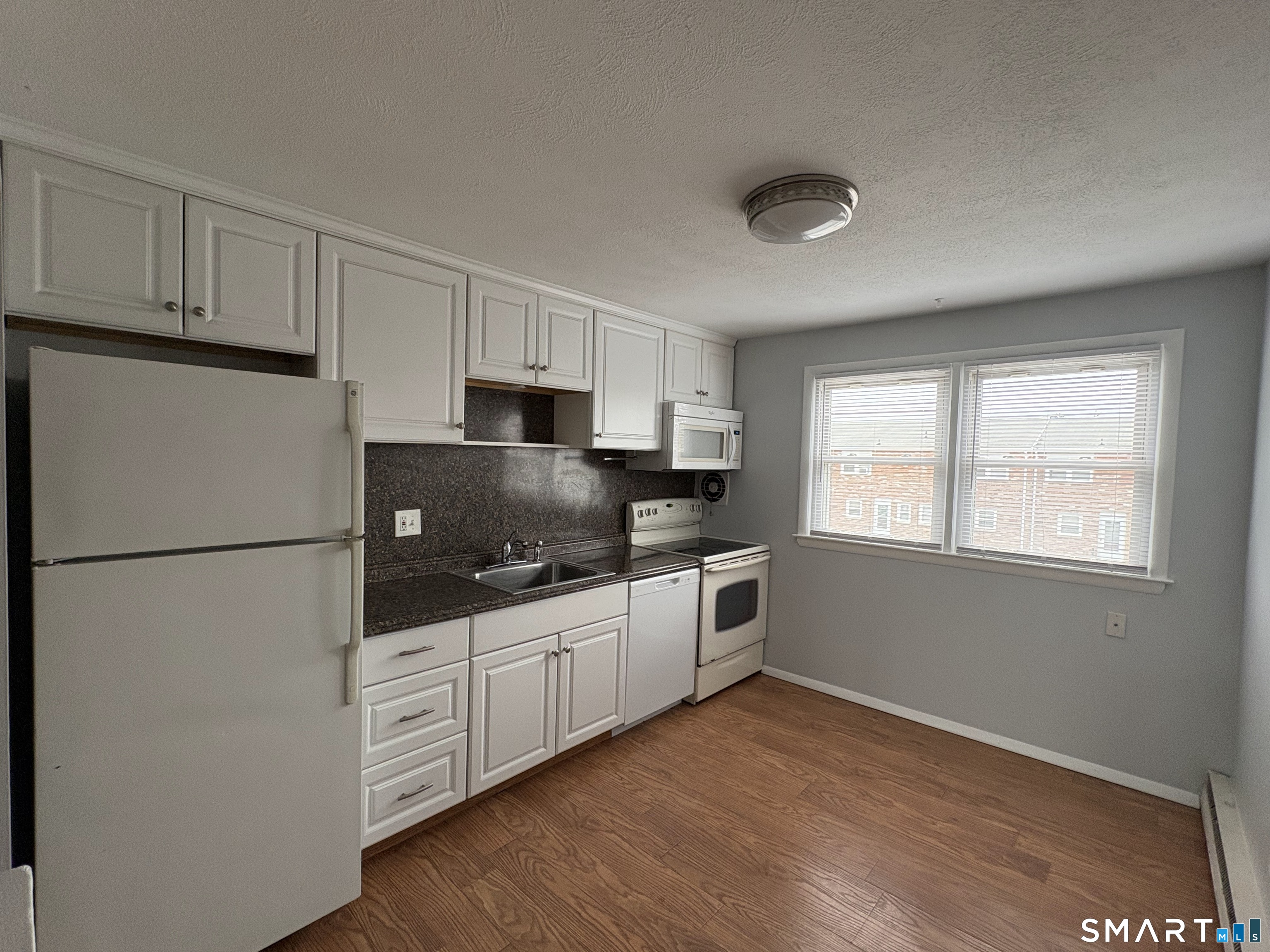 53 Hiltbrand Road, Unit 310 Bristol, CT 06010 - Photo 1 of 11