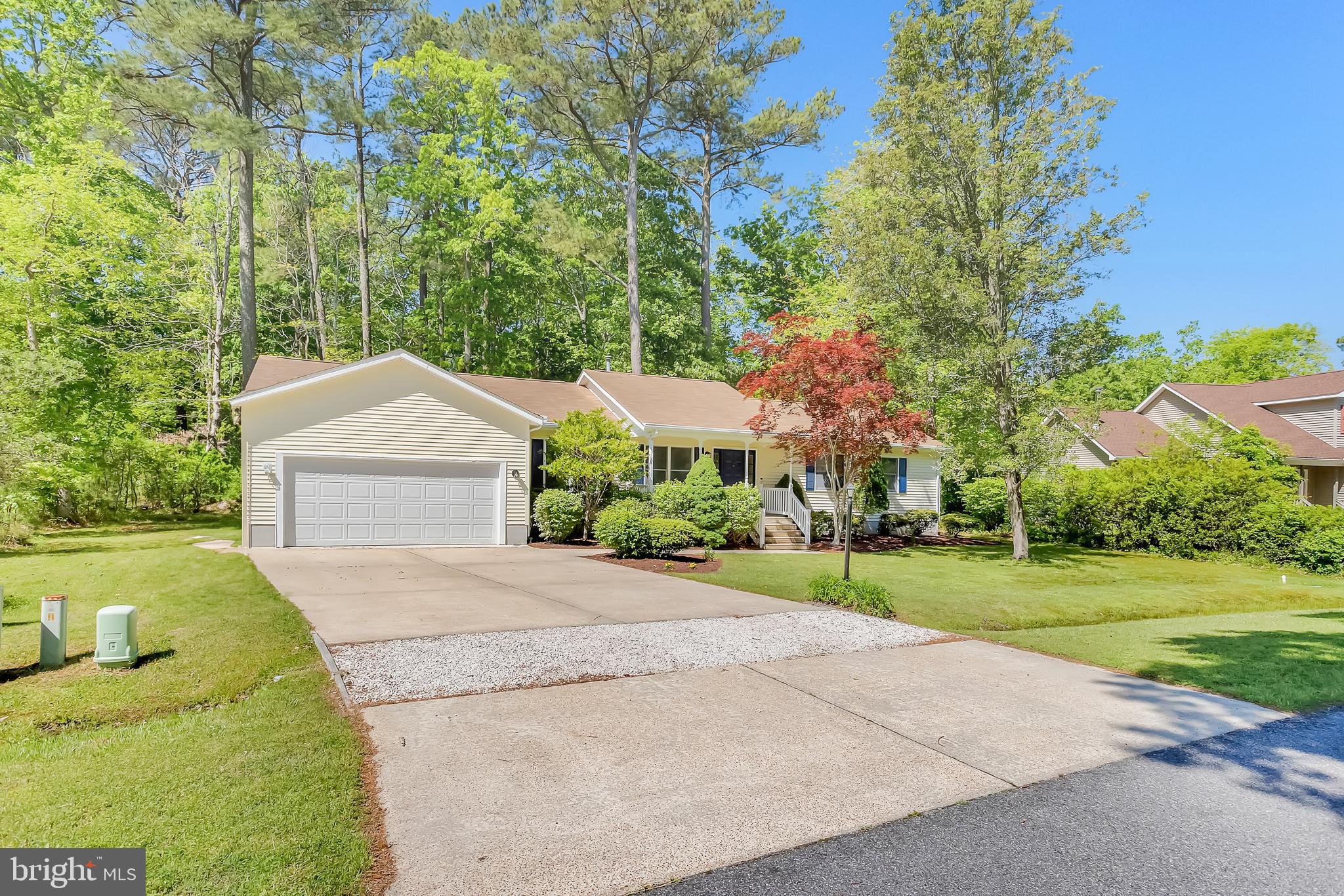 5 Mist Flower Road Ocean Pines, MD 21811 - Photo 3 of 41 a front view of a house with a yard and trees