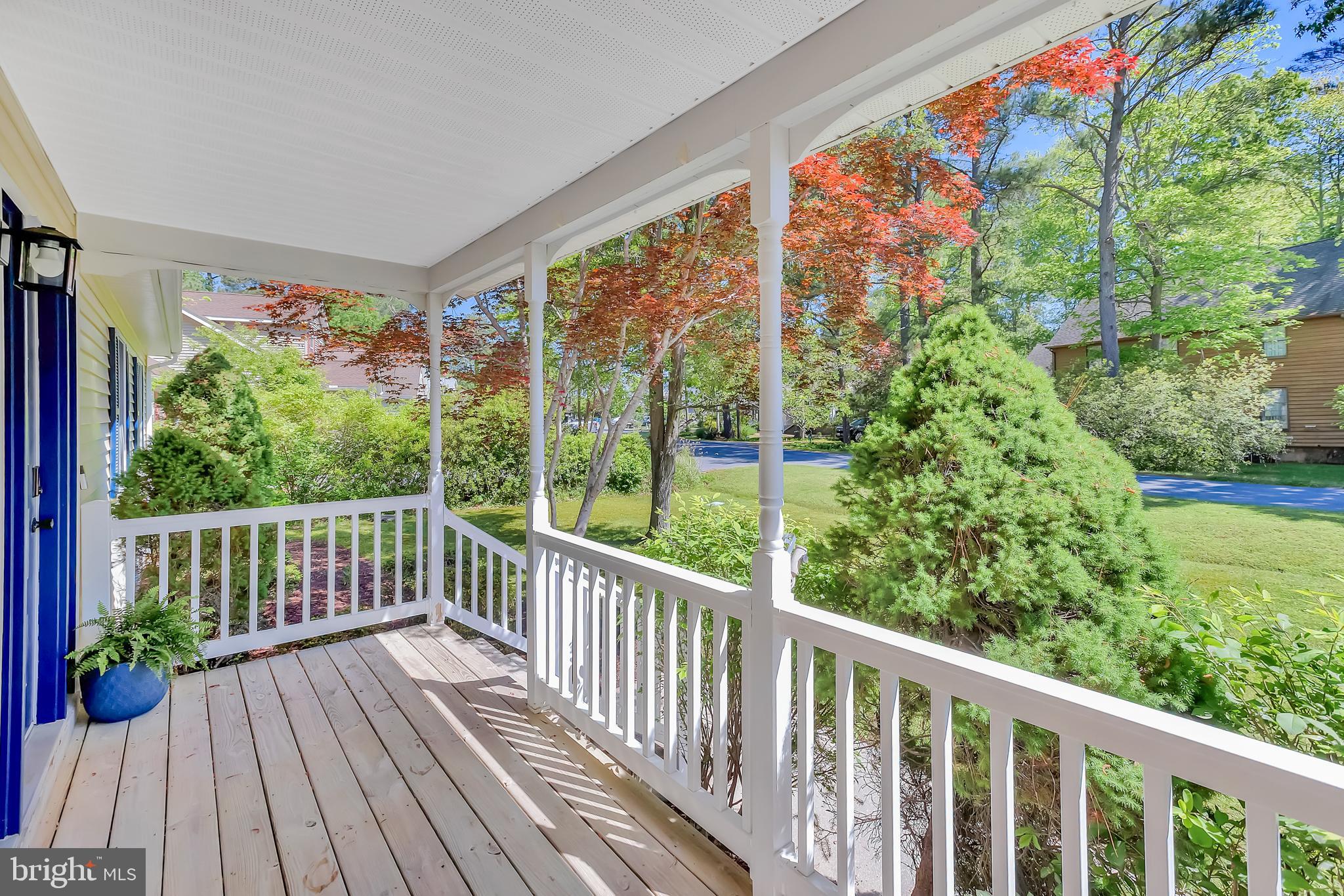 5 Mist Flower Road Ocean Pines, MD 21811 - Photo 4 of 41 a view of a balcony with wooden floor