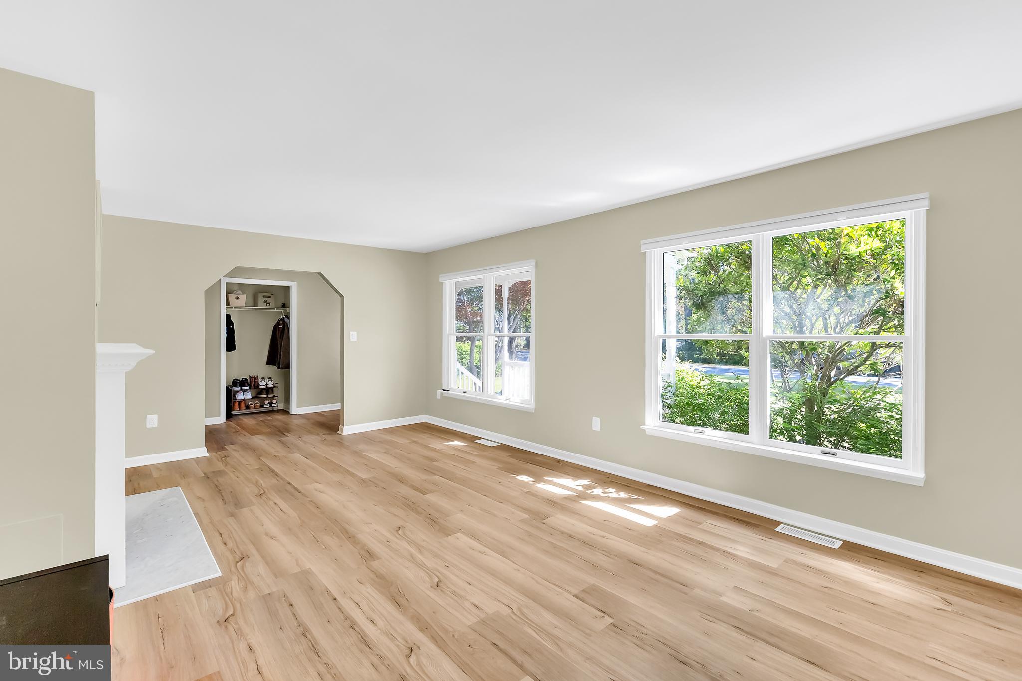 5 Mist Flower Road Ocean Pines, MD 21811 - Photo 9 of 41 a view of an empty room with wooden floor and a window