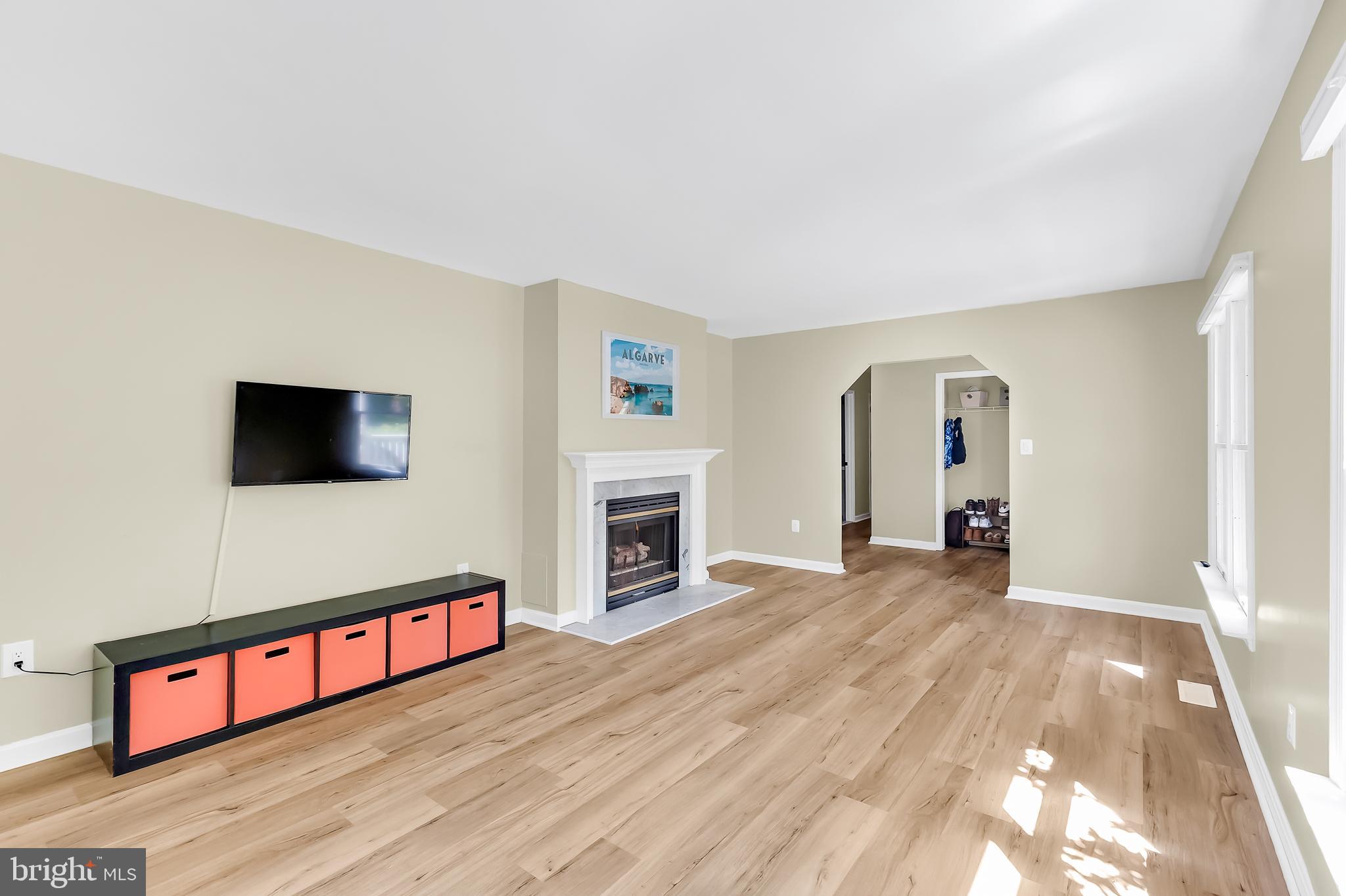 5 Mist Flower Road Ocean Pines, MD 21811 - Photo 10 of 41 a living room with fireplace furniture and a flat screen tv