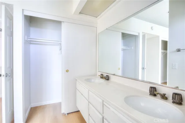 a view of a kitchen with wooden floor