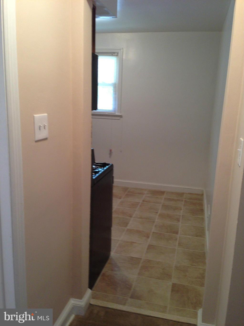 5901 Ravenswood Road Riverdale, MD 20737 - Photo 11 of 29 View from hallway to kitchen