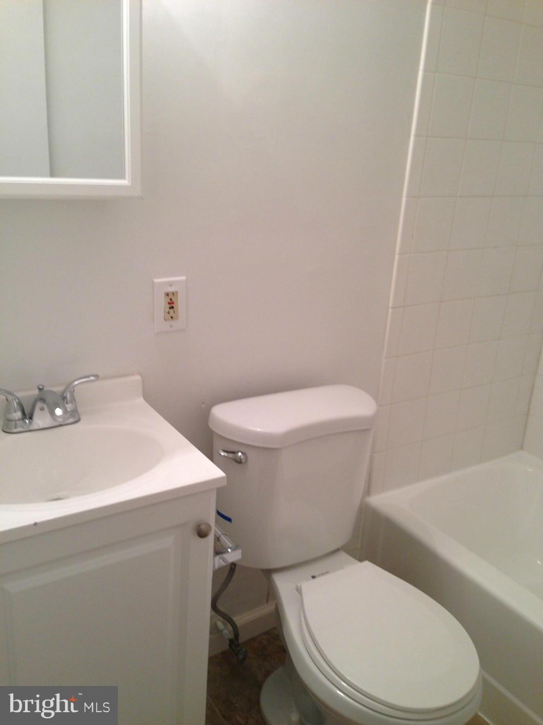 5901 Ravenswood Road Riverdale, MD 20737 - Photo 15 of 29 Basement Bathroom w/ new fixtures
