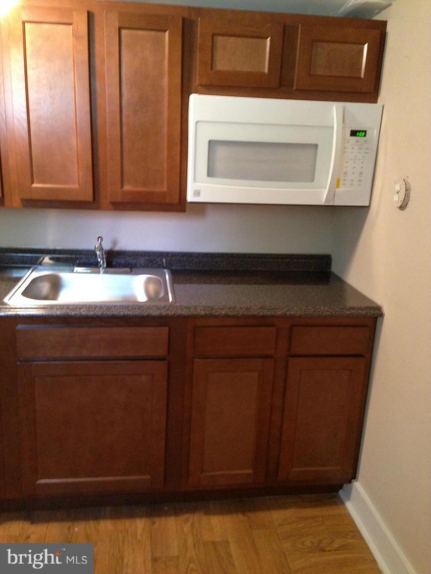 5901 Ravenswood Road Riverdale, MD 20737 - Photo 17 of 29 Basement Kitchenette Area