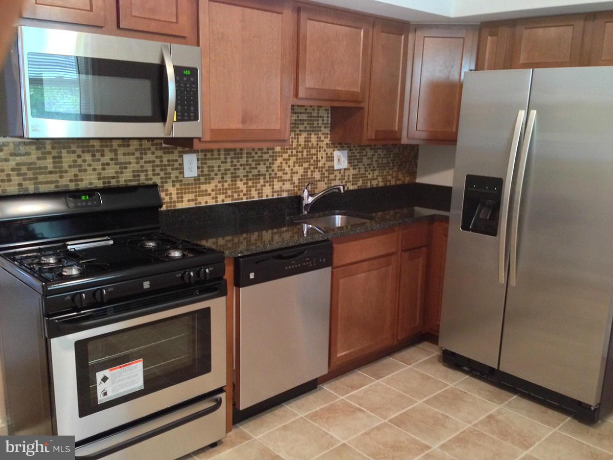 5901 Ravenswood Road Riverdale, MD 20737 - Photo 3 of 29 Gourmet Kitchen w/ SS appliances