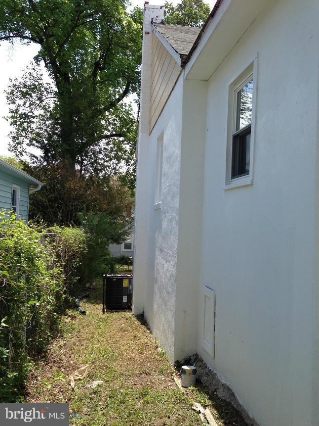 5901 Ravenswood Road Riverdale, MD 20737 - Photo 26 of 29 Side Elevation w/ new AC condenser in background