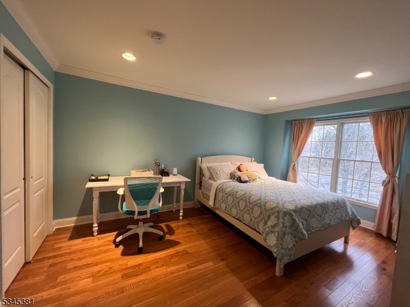 43 Georgetown Court Bernards, NJ 07920 - Photo 9 of 13 a bed room with a bed and a window