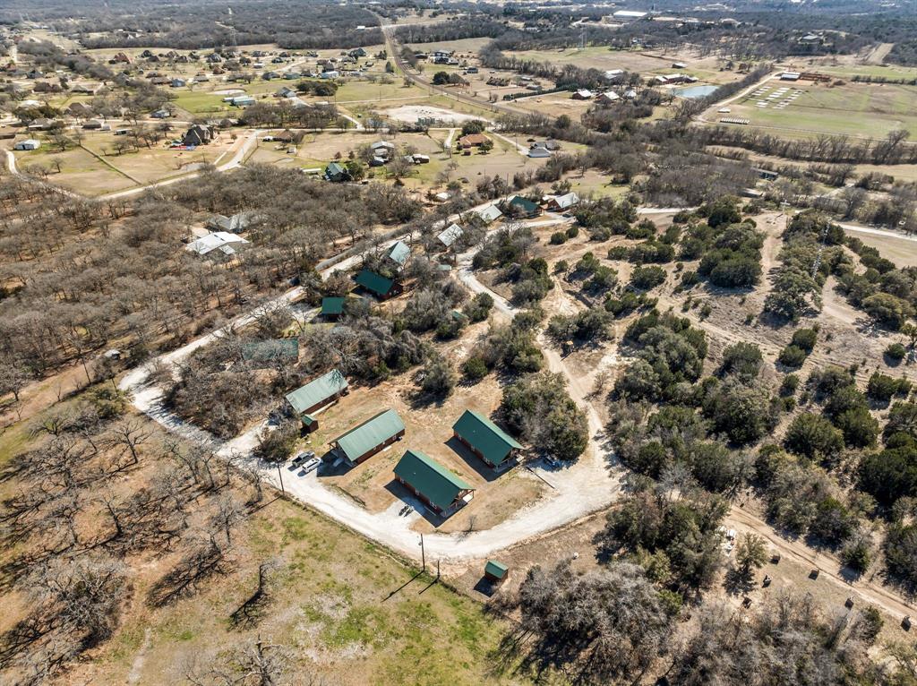 7718 Fm 1886 Azle, TX 76020 - Photo 15 of 16 an aerial view of residential houses with outdoor space