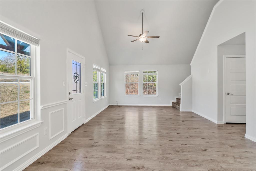 7718 Fm 1886 Azle, TX 76020 - Photo 8 of 16 wooden floor in an empty room with a window