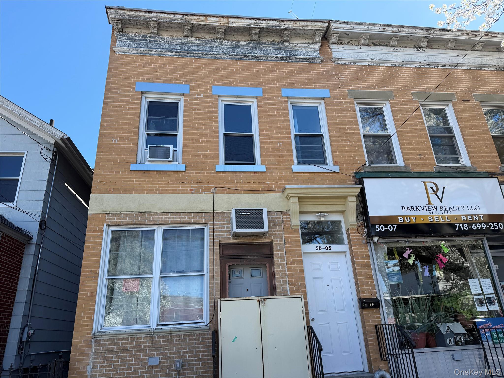 50-05 108th Street Queens, NY 11368 - Photo 2 of 16 a front view of a building