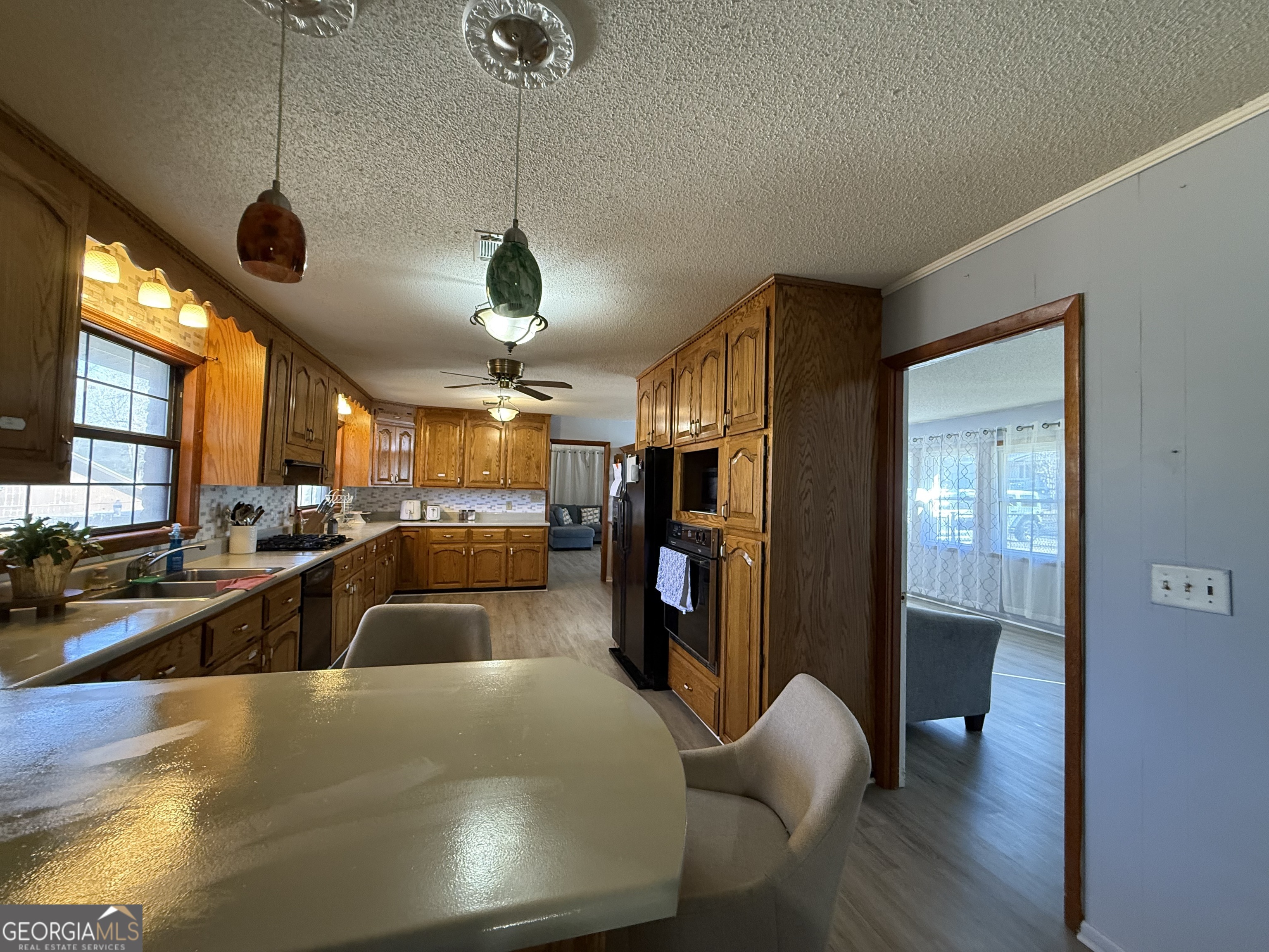 102 Hemlock Street Warner Robins, GA 31093 - Photo 12 of 32 a view of a living room and dining room