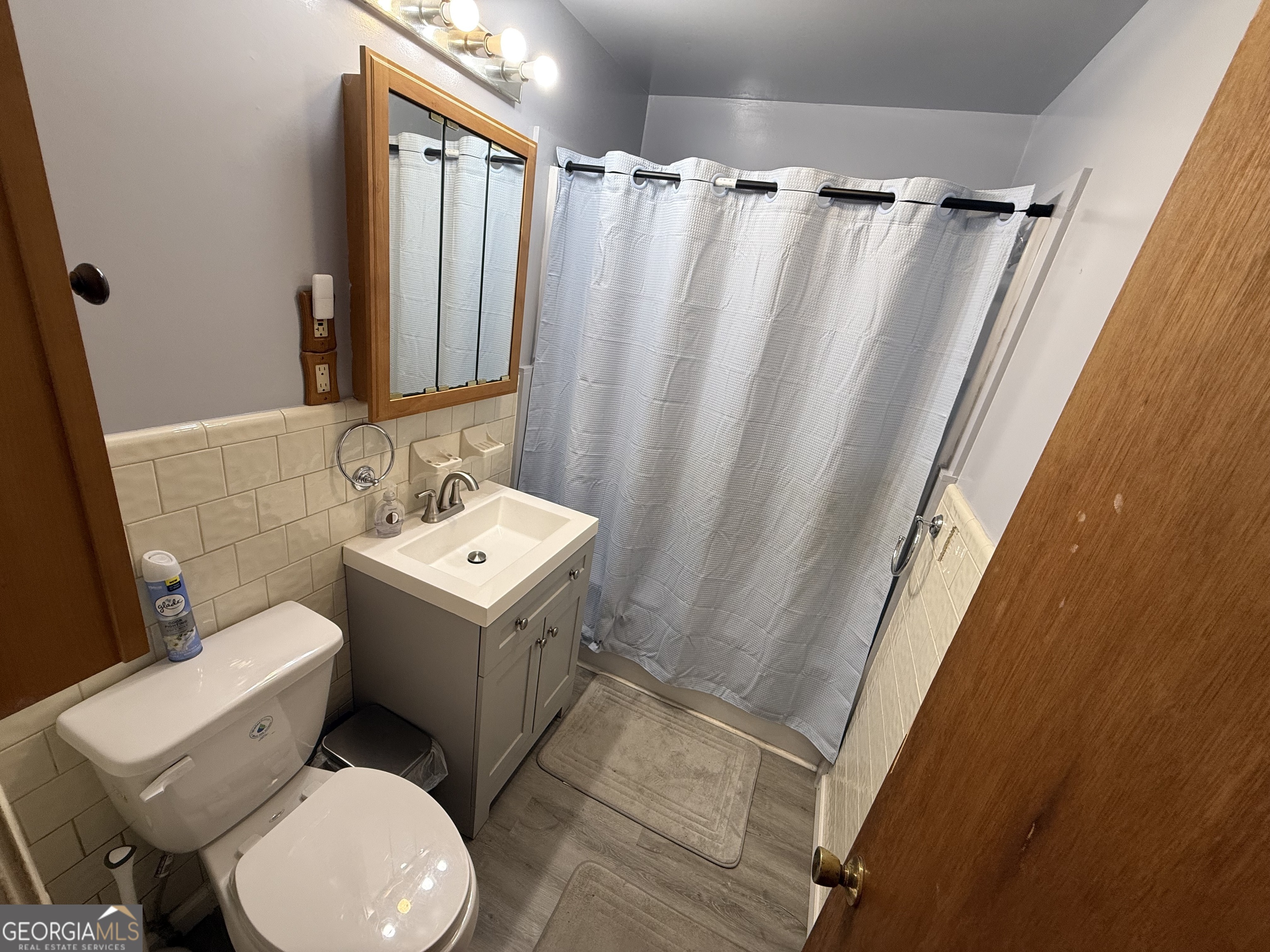 102 Hemlock Street Warner Robins, GA 31093 - Photo 17 of 32 a white toilet sitting next to a sink