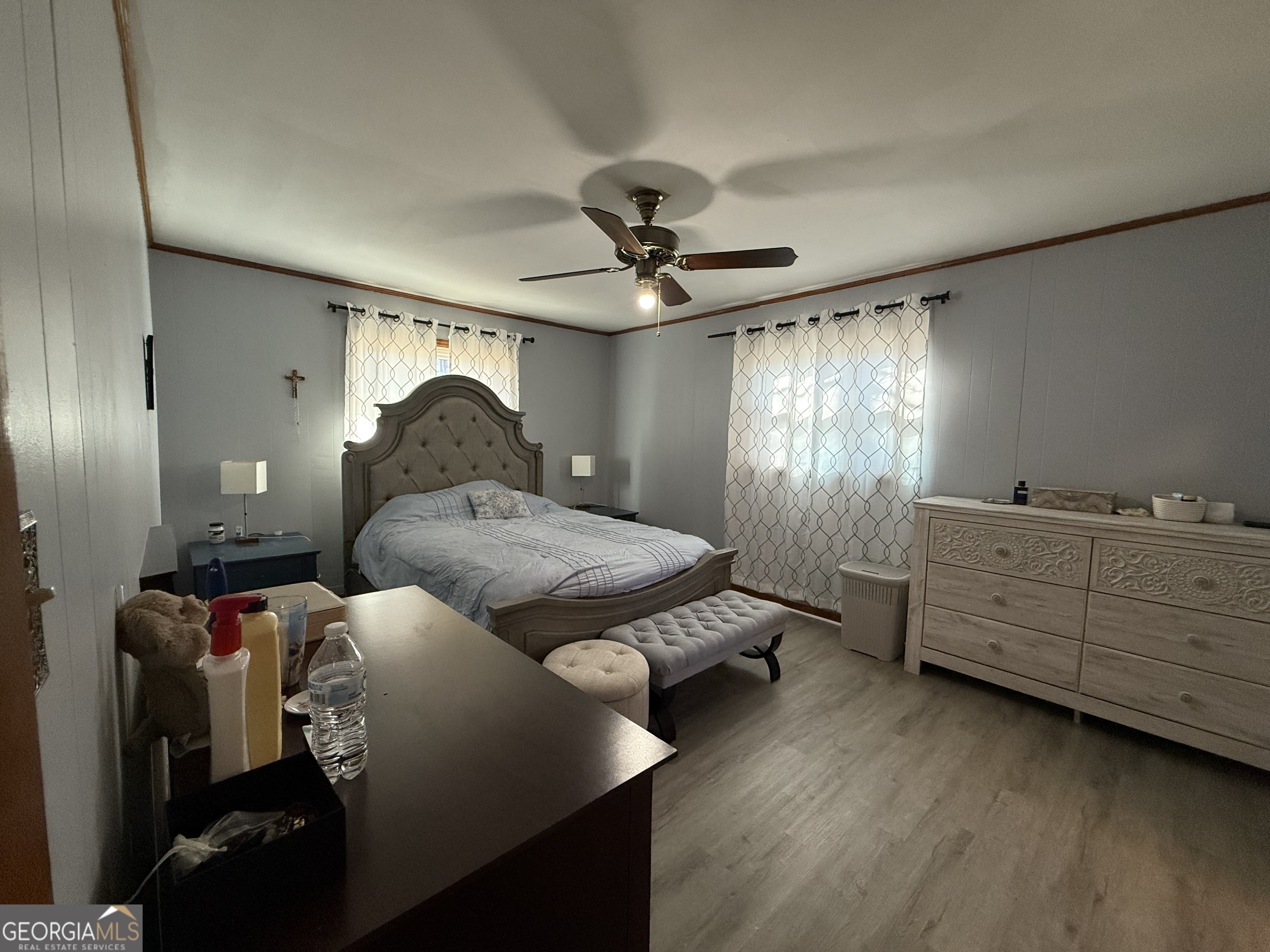 102 Hemlock Street Warner Robins, GA 31093 - Photo 20 of 32 a bed room with a bed and a chandelier