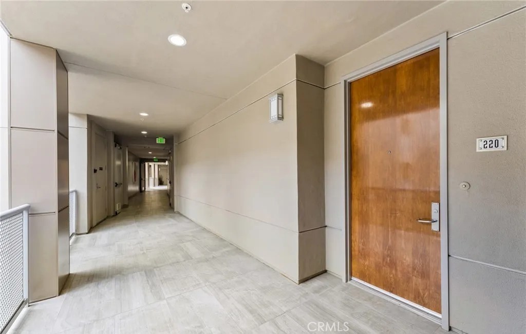 21 Gramercy, Unit 220 Irvine, CA 92612 - Photo 26 of 43 a view of a hallway with closet and a bathroom