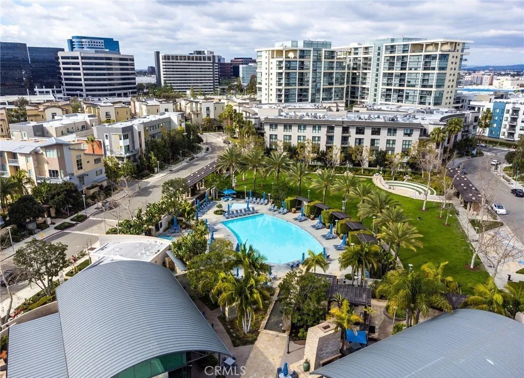 21 Gramercy, Unit 220 Irvine, CA 92612 - Photo 27 of 43 a view of building with outdoor space