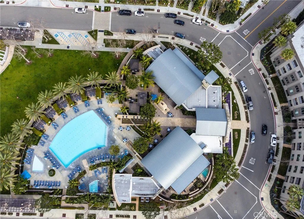 21 Gramercy, Unit 220 Irvine, CA 92612 - Photo 30 of 43 an aerial view of a house with garden space and street view