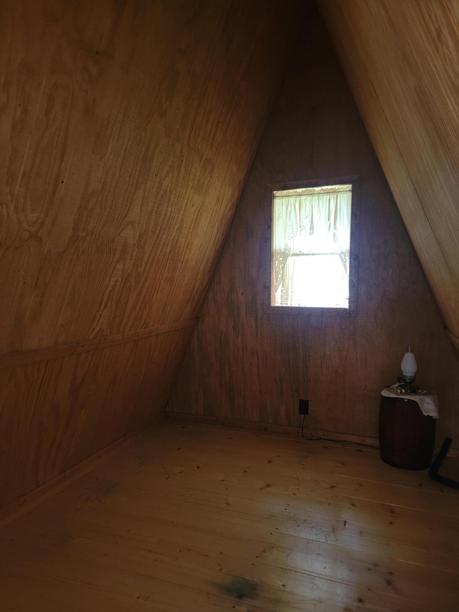 491 Klinger Hill Road Benton, PA 17814 - Photo 31 of 76 wooden floor and window in an empty room