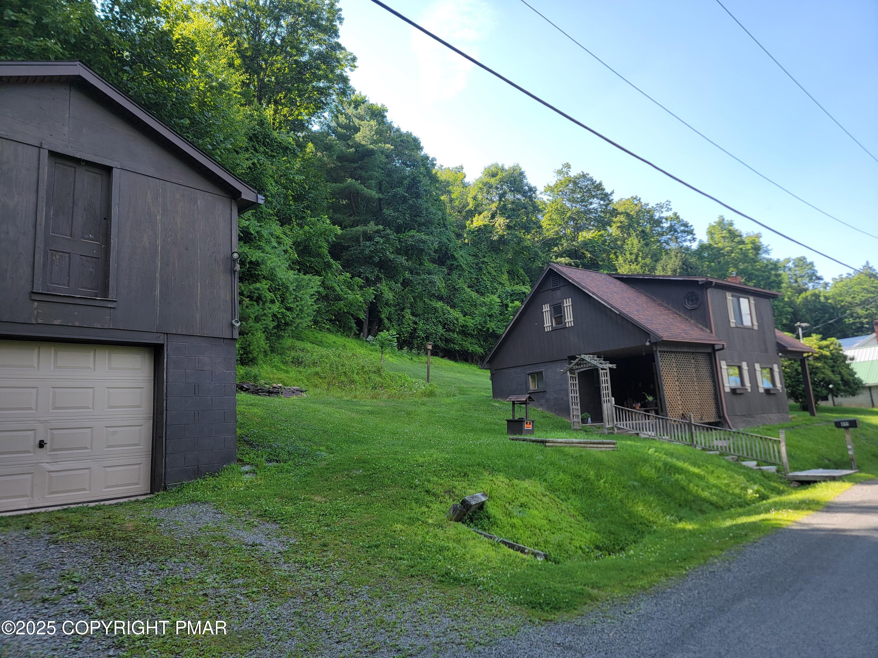 491 Klinger Hill Road Benton, PA 17814 - Photo 4 of 76 a view of a house with a yard