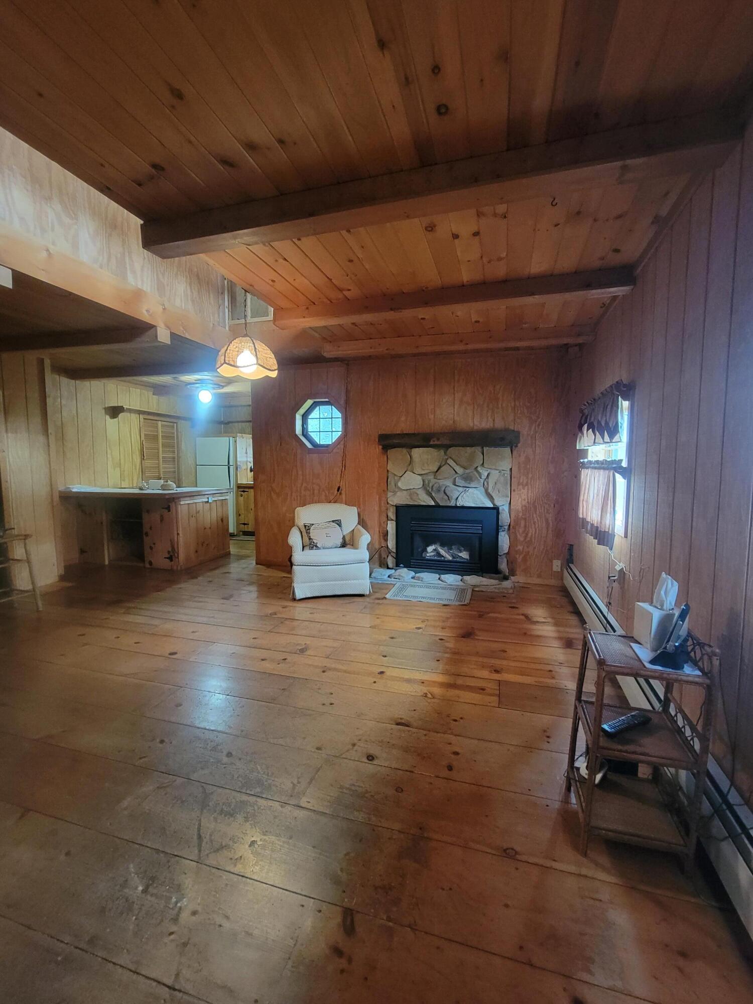 491 Klinger Hill Road Benton, PA 17814 - Photo 48 of 76 a room with furniture and a fireplace