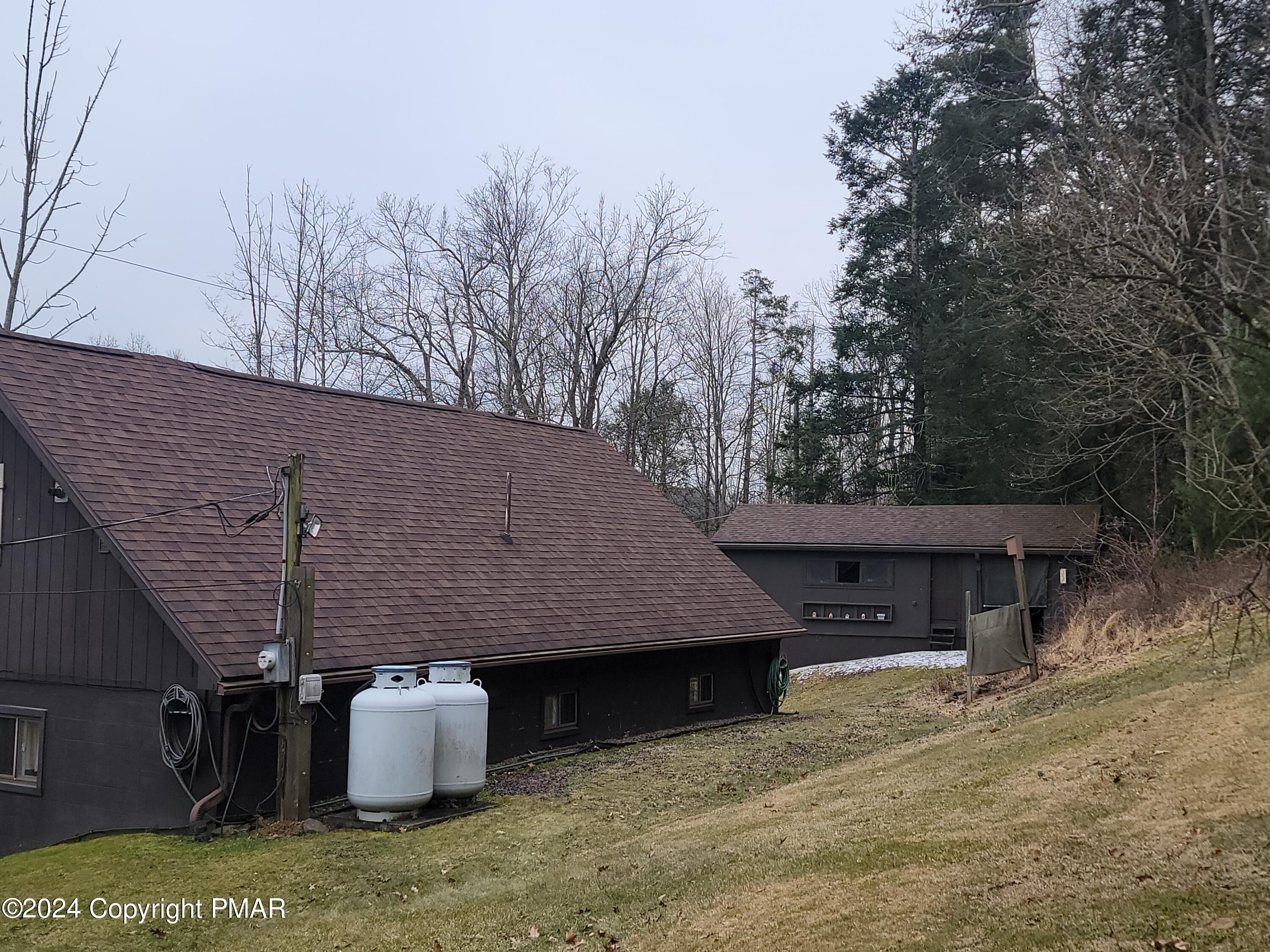 491 Klinger Hill Road Benton, PA 17814 - Photo 65 of 76 a view of a house with backyard and sitting area