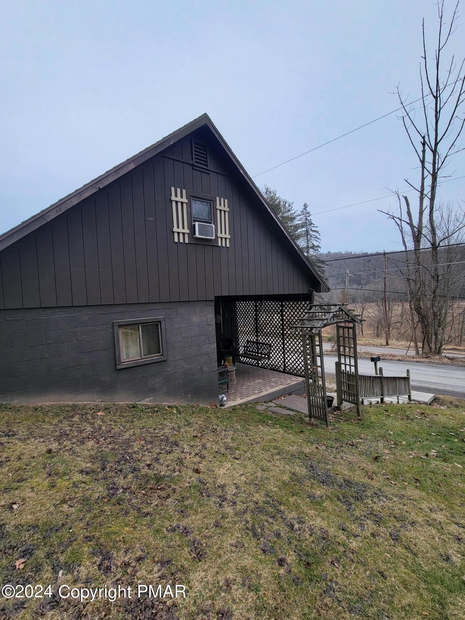491 Klinger Hill Road Benton, PA 17814 - Photo 72 of 76 a front view of a house with a yard