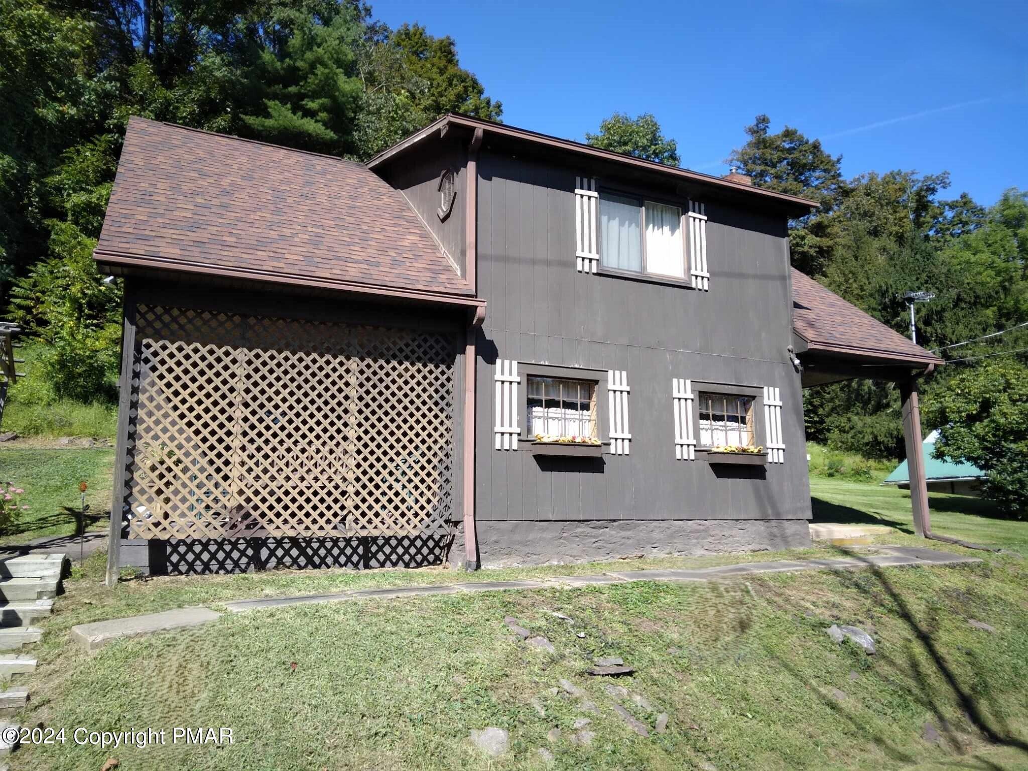 491 Klinger Hill Road Benton, PA 17814 - Photo 8 of 76 a front view of a house with a yard