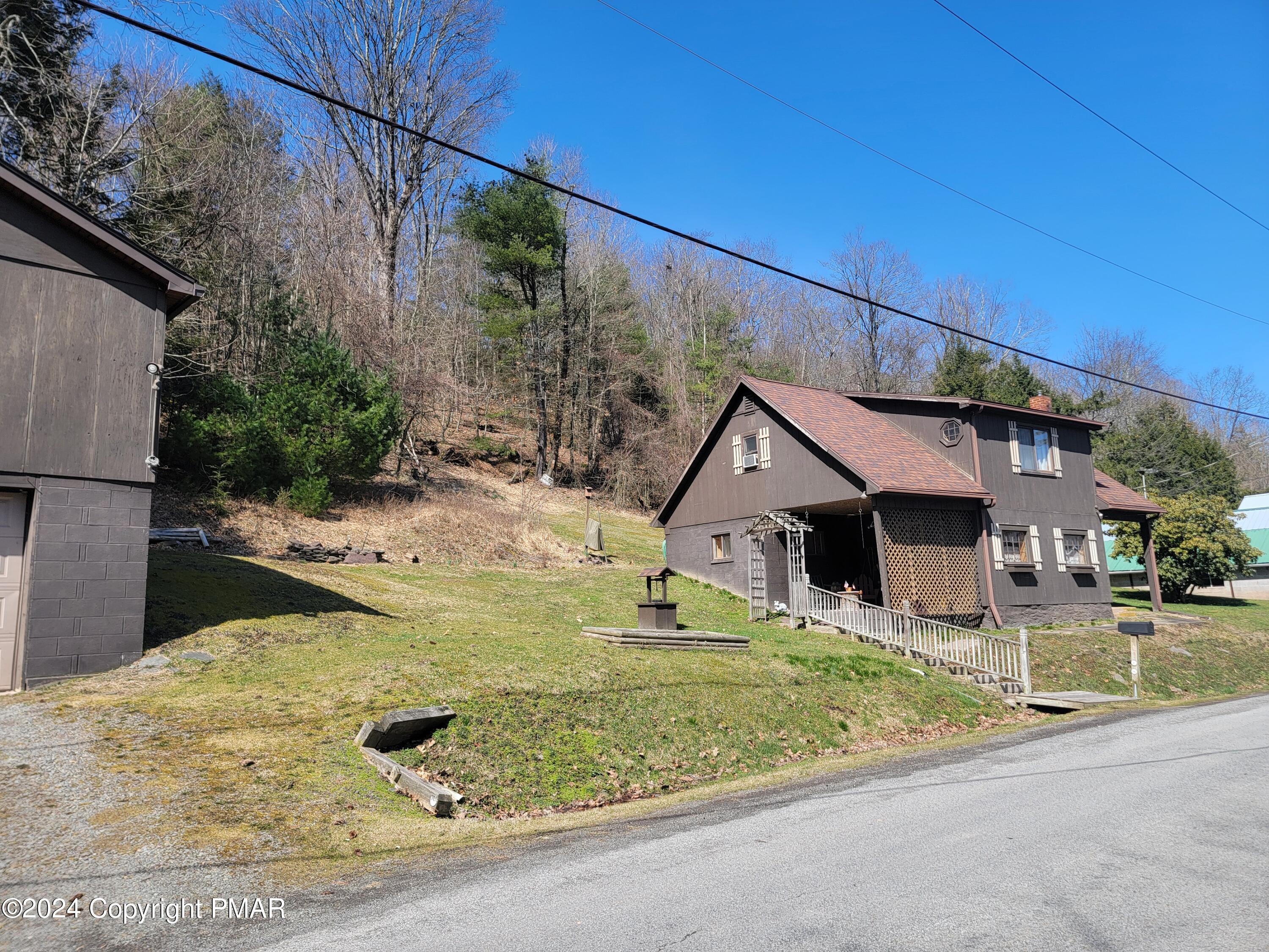 491 Klinger Hill Road Benton, PA 17814 - Photo 9 of 76 a view of a house with snow in front of it