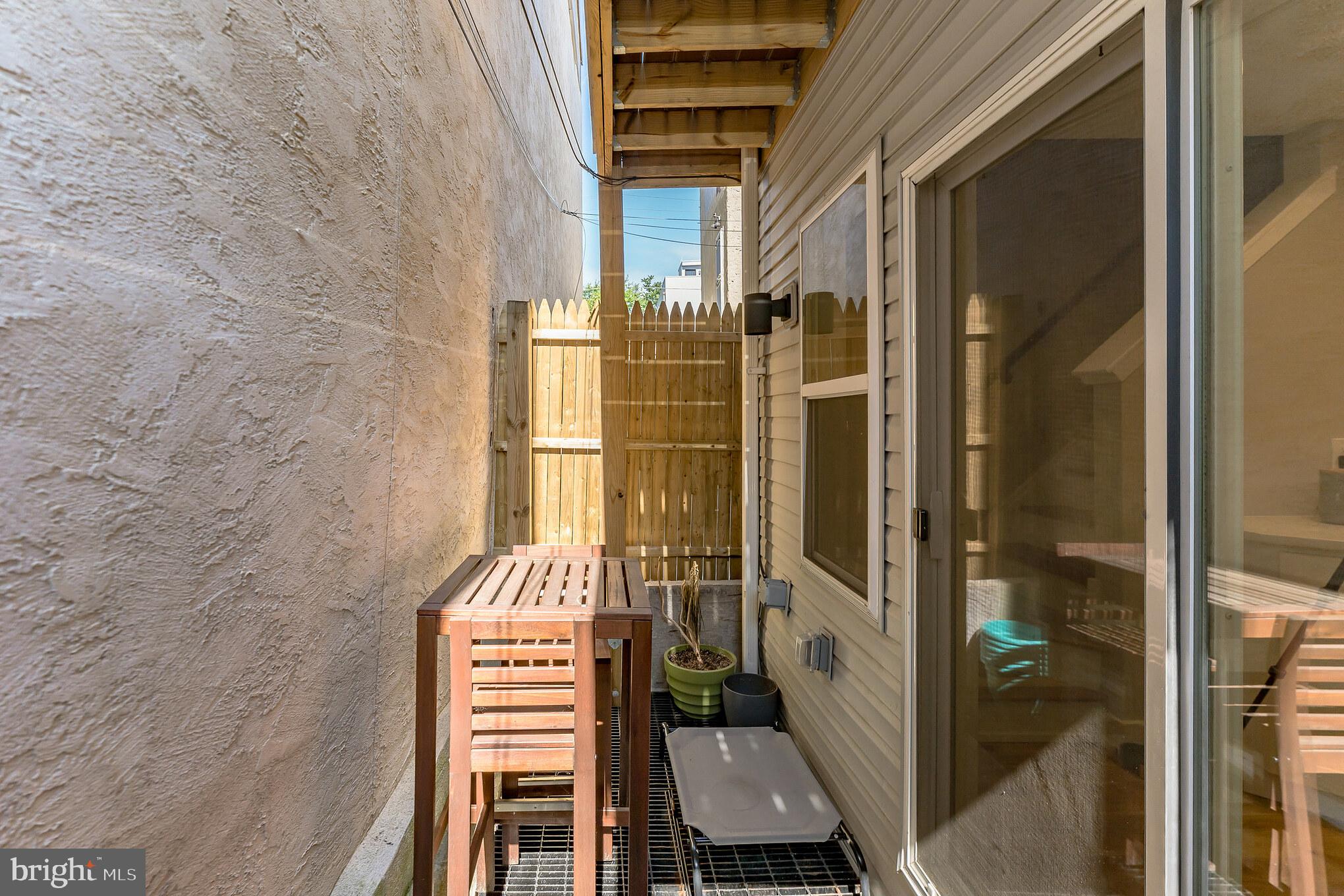 614 Master Street, Unit 1 Philadelphia, PA 19122 - Photo 27 of 28 a view of a balcony with a door