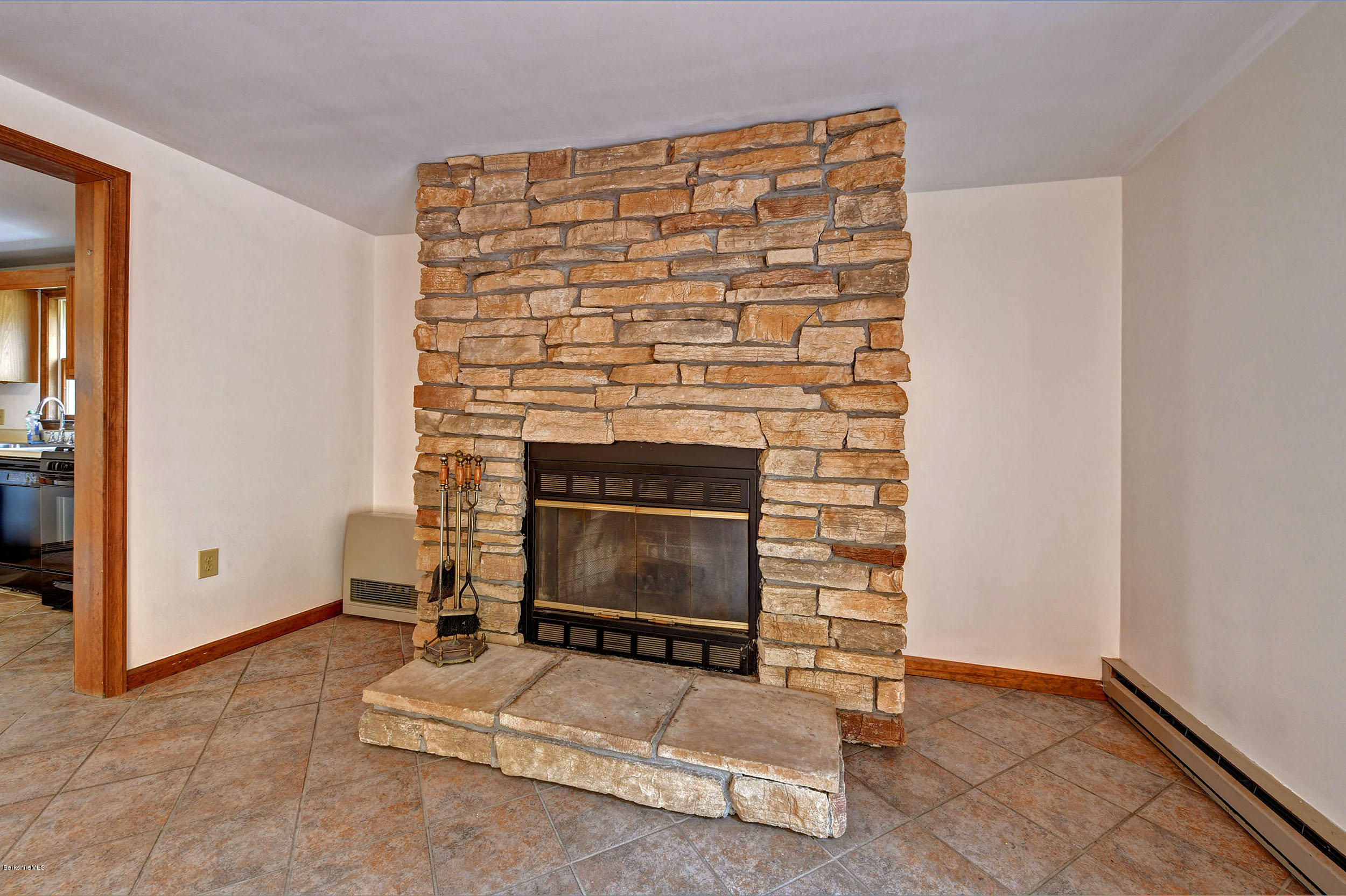 588 Leonhardt Road Becket, MA 01223 - Photo 13 of 32 588-13-Living Room Fireplace