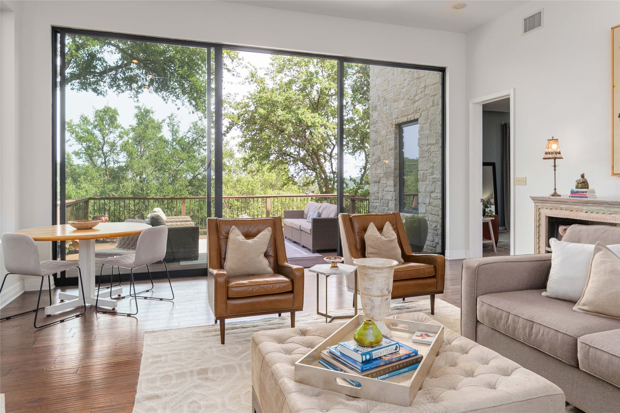 Living area with wood finished floors and baseboards
