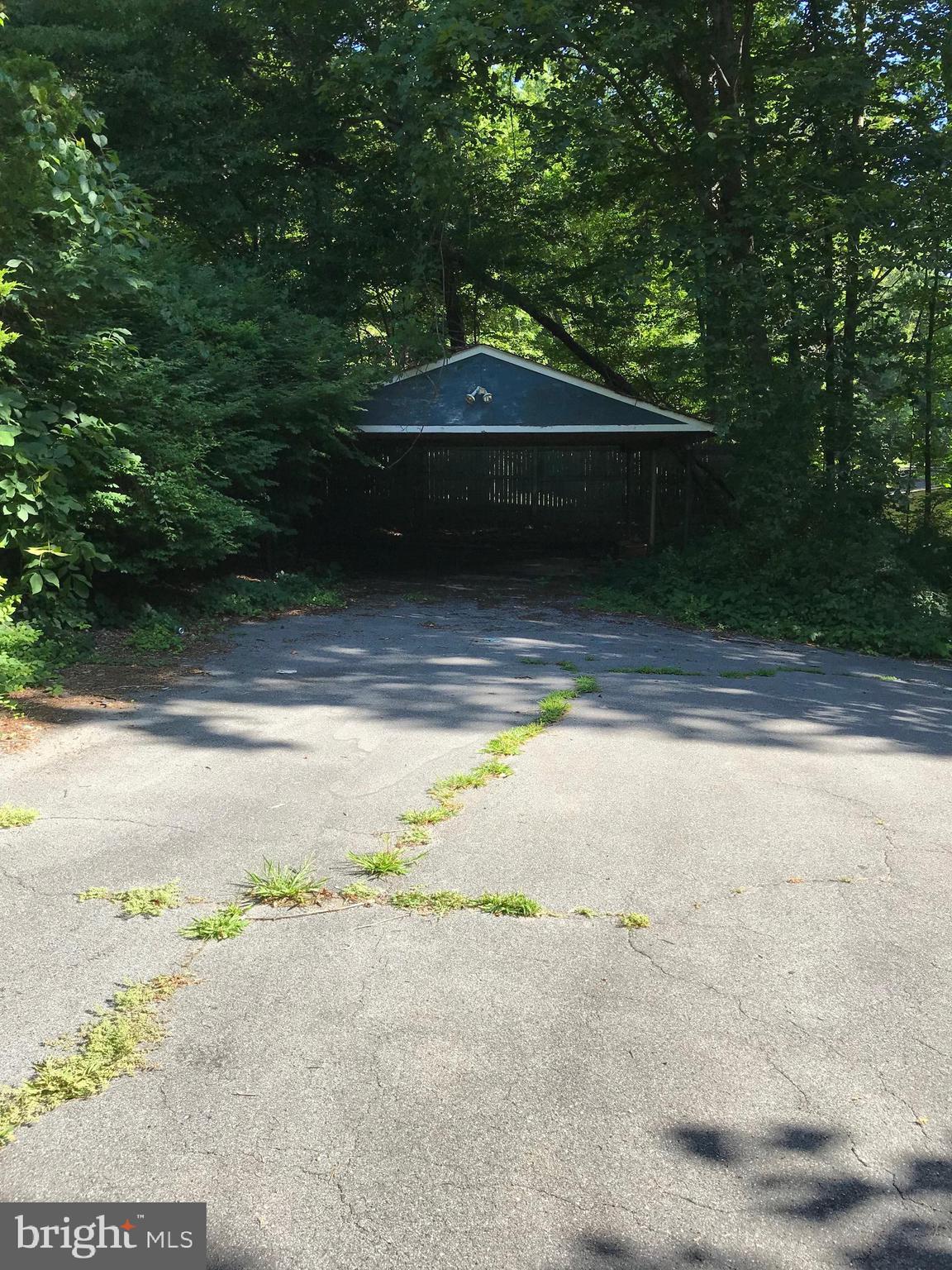 2130 Stinnett Road Huntingtown, MD 20639 - Photo 16 of 16 Large Carport and Ample Driveway