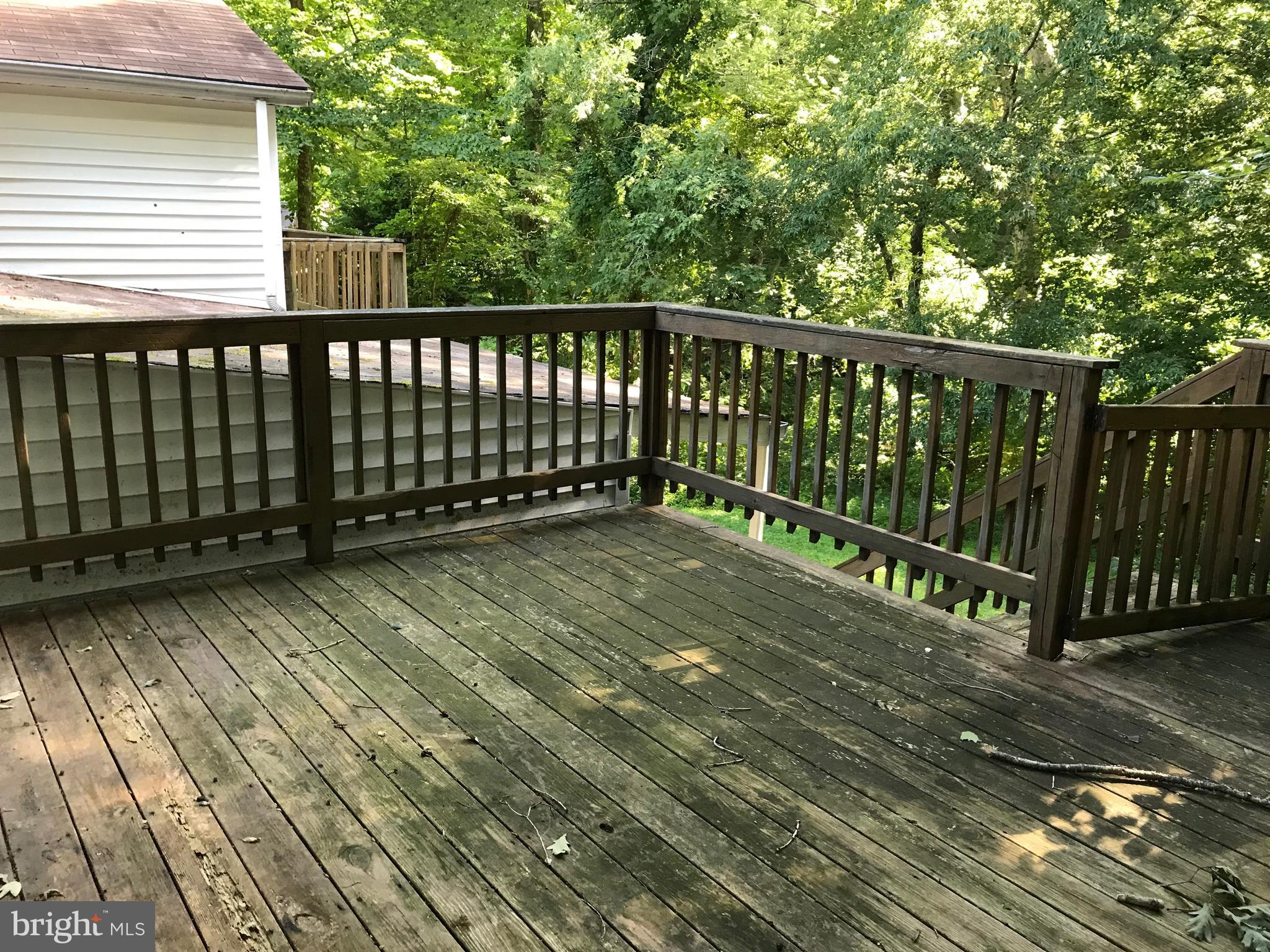 2130 Stinnett Road Huntingtown, MD 20639 - Photo 5 of 16 Deck off of dining room