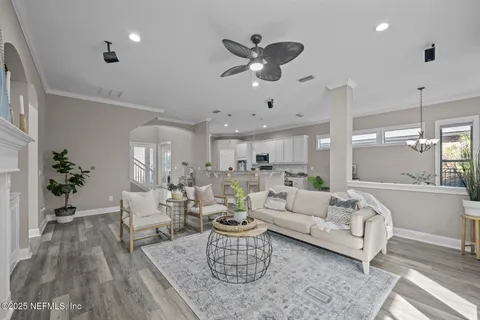 a bed room with a bed and a potted plant