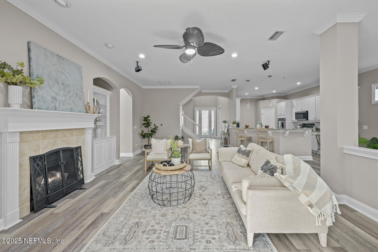 165 St John's Forest Boulevard St. Johns, FL 32259 - Photo 16 of 103 a living room with furniture and a fireplace