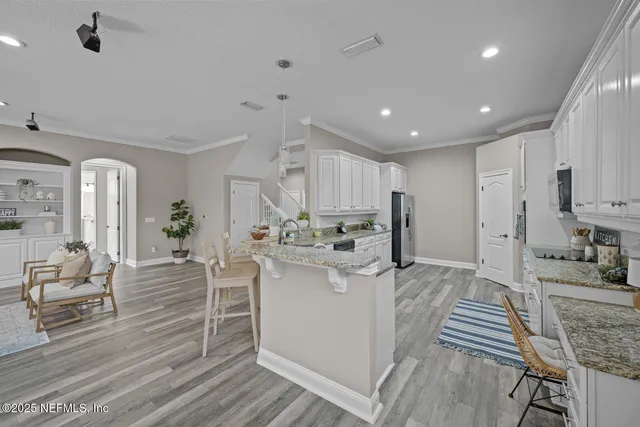 a view of an empty room with a balcony